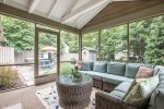 Magical screen porch overlooking the backyard space